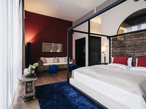 Voodi või voodid majutusasutuse Linsberg Asia Hotel, Spa & Therme - Adults Only toas
