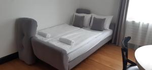 Postel nebo postele na pokoji v ubytování Tauernhaus Appartment