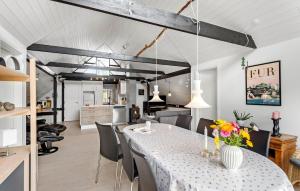 a dining room and kitchen with a table and chairs at Awesome Home In Hemmet With Wifi in Hemmet