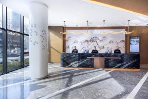Ο χώρος του λόμπι ή της ρεσεψιόν στο Atour X Hotel Nanjing Lishui Hello City