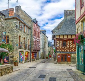 an empty street in an old town with buildings at La Ville Hello, A Spacious House, Sleeps 9, In Rur in Guillac