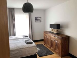 Postel nebo postele na pokoji v ubytování Tauernhaus Appartment