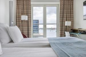 Katil atau katil-katil dalam bilik di Copenhagen Island Hotel