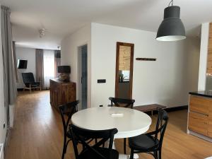 TV a/nebo společenská místnost v ubytování Tauernhaus Appartment