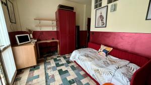 Postel nebo postele na pokoji v ubytování Cuneo Centro Affittacamere