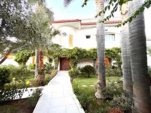 Κήπος έξω από το Luxueuse villa de 1100m à 500m de la plage