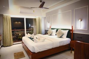 Hotel Sonar Bangla Puri客房内的一张或多张床位