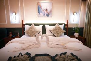Hotel Sonar Bangla Puri客房内的一张或多张床位