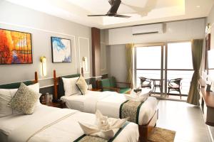 Hotel Sonar Bangla Puri客房内的一张或多张床位