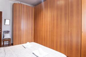 Posteľ alebo postele v izbe v ubytovaní [Duomo walking distance] elegant flat with view
