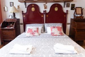 Posteľ alebo postele v izbe v ubytovaní [Duomo walking distance] elegant flat with view