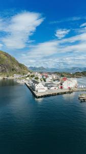 an aerial view of a dock in a body of water at Live Lofoten Hotel in Stamsund
