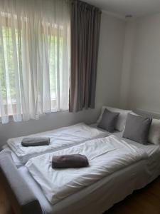 Postel nebo postele na pokoji v ubytování Tauernhaus Appartment