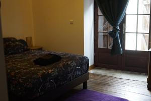 Posteľ alebo postele v izbe v ubytovaní Chambre d'Hôtes - Eco Gîte la Grange