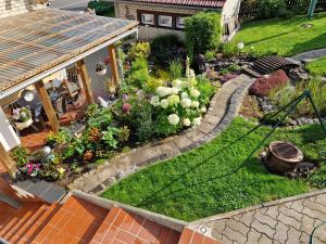 an aerial view of a garden with flowers at Ferienwohnung Am Öpitzer Berg in Pößneck