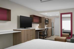 Televiisor ja/või meelelahutuskeskus majutusasutuses Home2 Suites By Hilton Poughkeepsie
