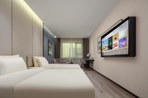 Televisyen dan/atau pusat hiburan di Atour Hotel Suzhou New District Science and Technology City