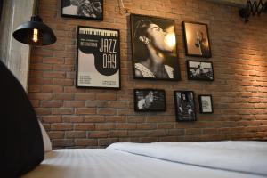 Ένα ή περισσότερα κρεβάτια σε δωμάτιο στο City Plus by CityBee