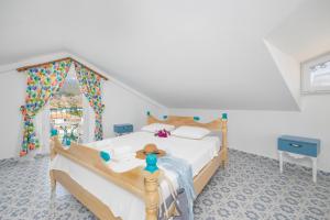 Postel nebo postele na pokoji v ubytování Villa Blue Island