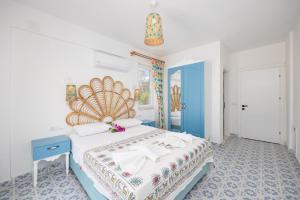 Postel nebo postele na pokoji v ubytování Villa Blue Island + 37 fotografií