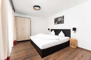 Posteľ alebo postele v izbe v ubytovaní A CASA Opal Appartements