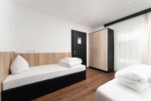 Posteľ alebo postele v izbe v ubytovaní A CASA Opal Appartements