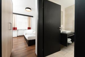 A bathroom at A CASA Opal Appartements Még 37 kép
