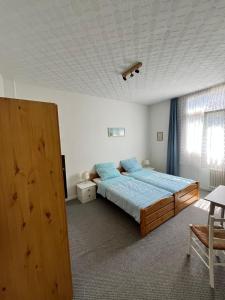 Postel nebo postele na pokoji v ubytování Hostel Burg Hausen
