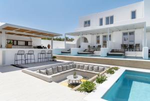 an image of a villa with a swimming pool at Quartano Suites by Heliessa, Adults Only in Naousa