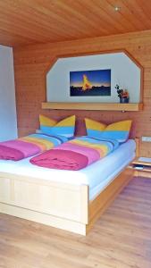 Postel nebo postele na pokoji v ubytování Appartements Garni Drei Wannen
