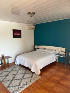 Una cama o camas en una habitación de Estudio como en casa