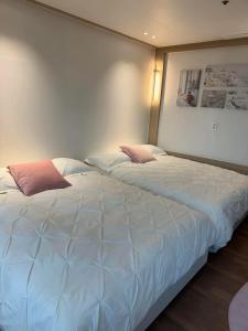Letto o letti in una camera di Hongdae sub 1min