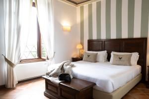 Łóżko lub łóżka w pokoju w obiekcie Al Castello Resort
