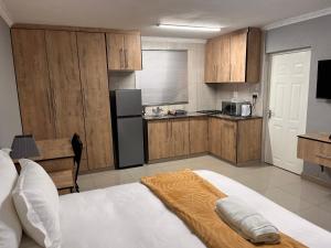 Dapur atau dapur kecil di Mashobs Guest House