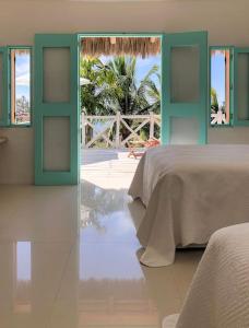 เตียงในห้องที่ Villa Coralillo in Careyes