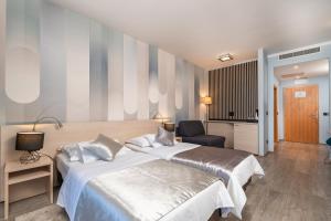 Voodi või voodid majutusasutuse Berkeley Hotel toas