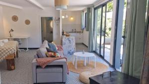 a living room with a couch and a table at Quinta da Lontra in Tábua +66 photos