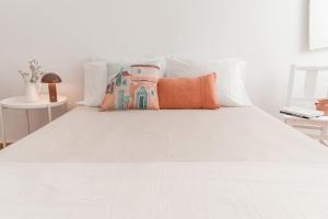 Katil atau katil-katil dalam bilik di Casa da Avó Manuela