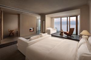 Llit o llits en una habitació de 慢境Slow Land半山海景花园酒店