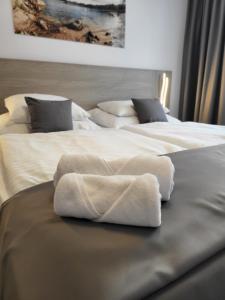 Postel nebo postele na pokoji v ubytování Hotel Crystal