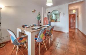a dining room with a table and chairs at 2 Bedroom Stunning Apartment In Nerja in Nerja