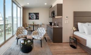 Posteľ alebo postele v izbe v ubytovaní VN17 Rooftop Suites by Adrez