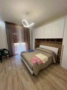 Ένα ή περισσότερα κρεβάτια σε δωμάτιο στο La casa del sole