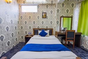 Rúm í herbergi á Chengfu Hotel And Restaurant