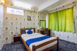 Rúm í herbergi á Chengfu Hotel And Restaurant