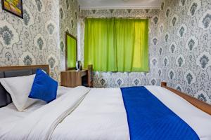 Rúm í herbergi á Chengfu Hotel And Restaurant