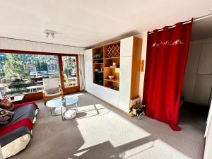 Зона вітальні в Appartement lumineux & central