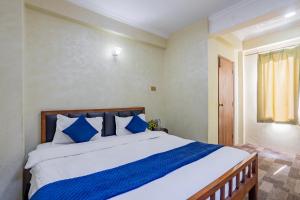 Rúm í herbergi á Chengfu Hotel And Restaurant