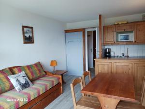 Η κουζίνα ή μικρή κουζίνα στο 2 pièces pour 5 pers, piscine, animaux admis, parking, proche télécabine - FR-1-411-320