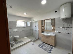 Koupelna v ubytování Markovi Apartments
